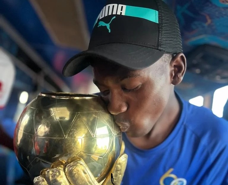 Junior Makunike with the Chibuku Super Cup Trophy